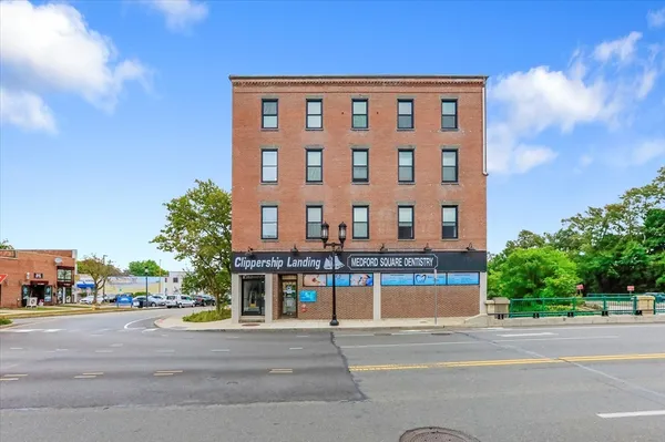 front view of a building with a street
