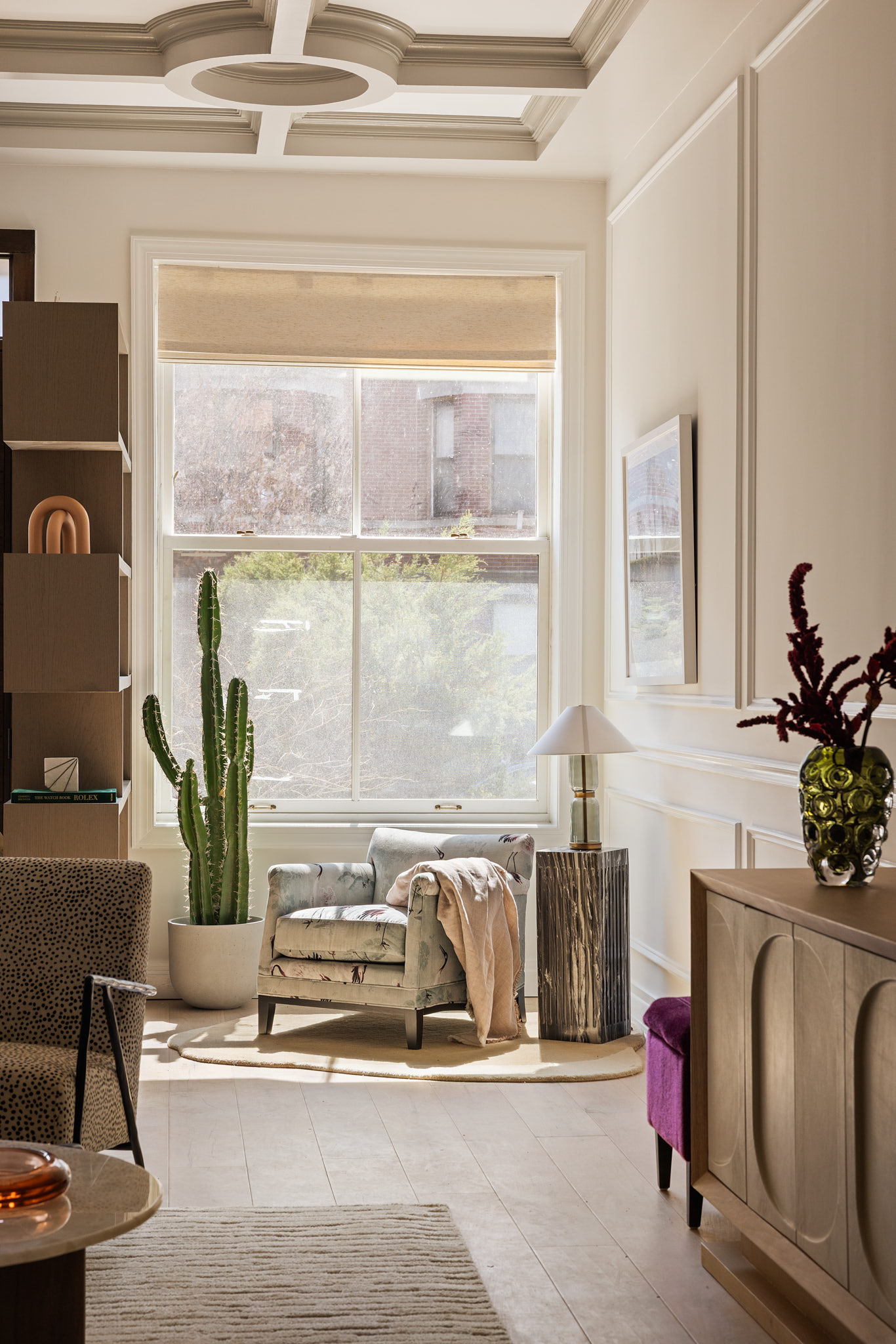 143 Milton Street Brooklyn, NY 11222 - Photo 3 of 19 a living room with fireplace furniture and a potted plant