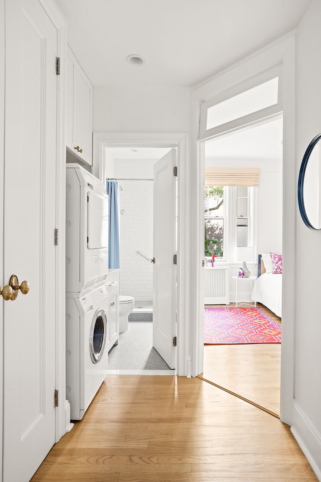 35-16 79th Street, Unit 1 Queens, NY 11372 - Photo 10 of 14 a bathroom with a sink mirror and shower