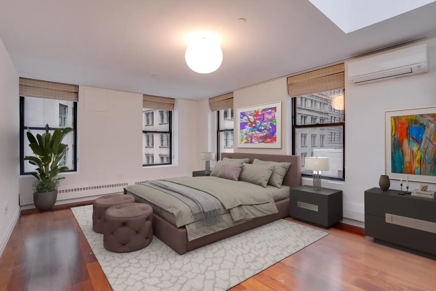 a bedroom with a bed furniture and paintings on the wall