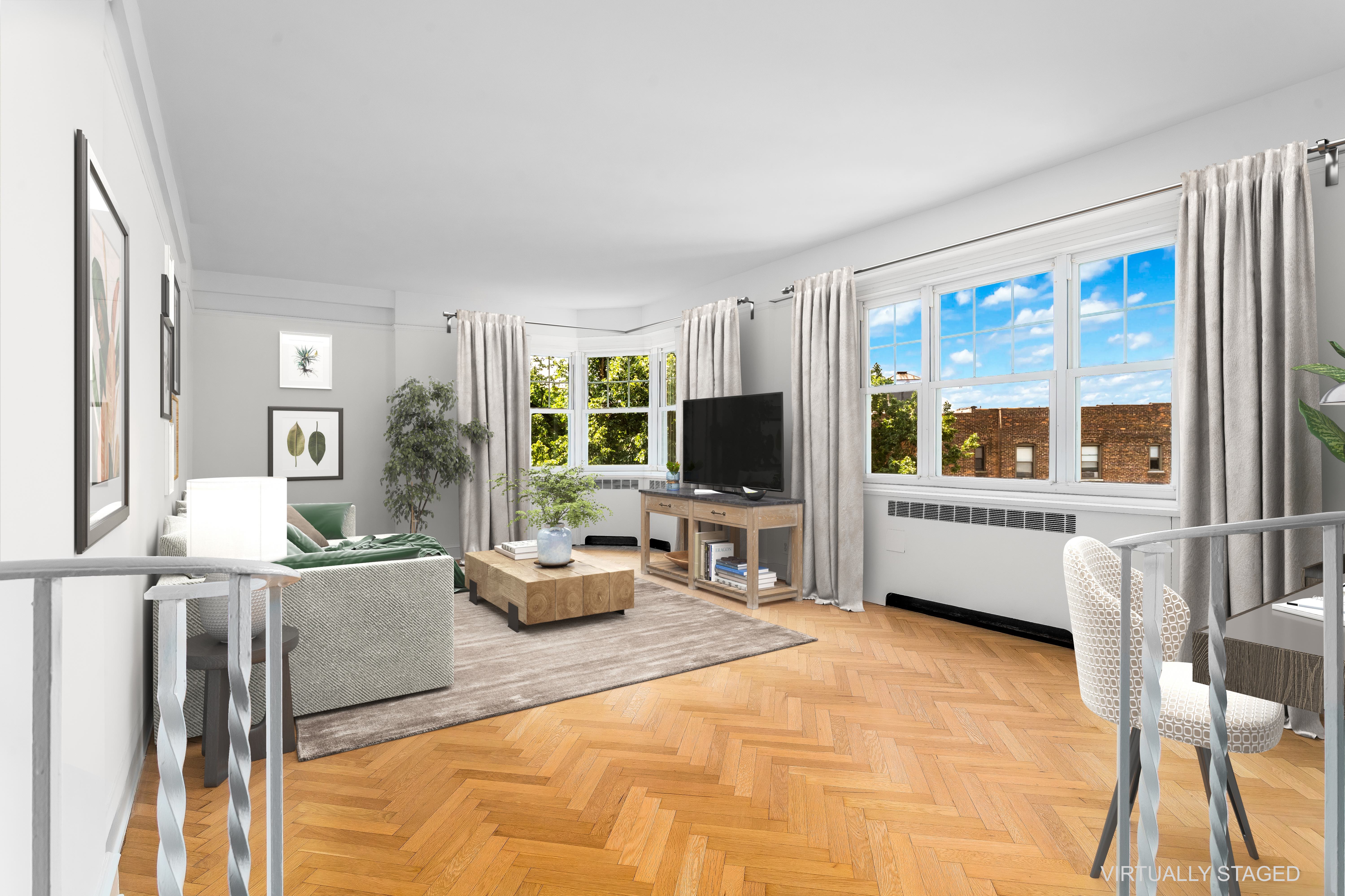 120 Cabrini Boulevard, Unit 63 Manhattan, NY 10033 - Photo 1 of 28 a living room with furniture and a flat screen tv