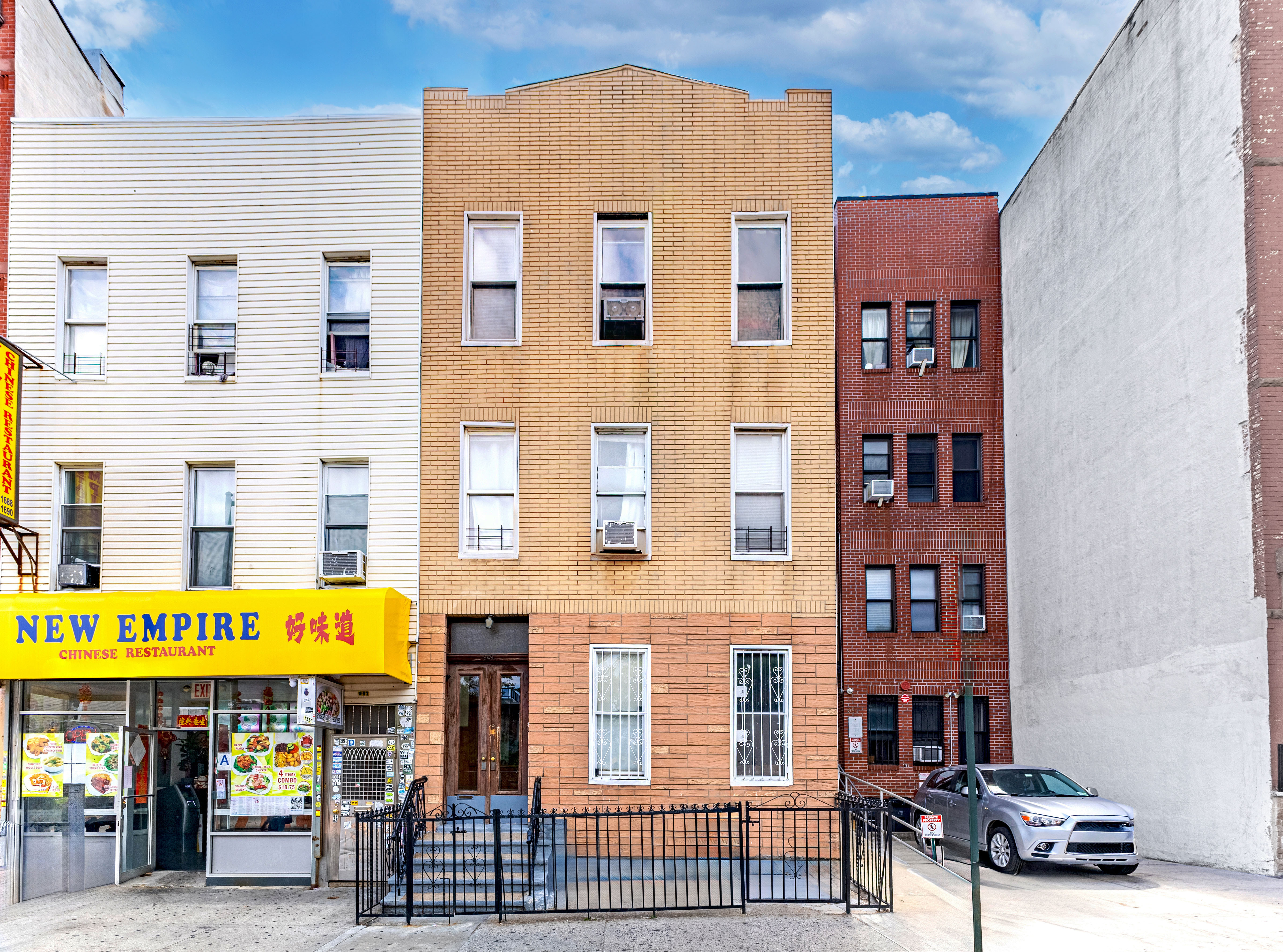 949 4th Avenue Brooklyn, NY 11232 - Photo 1 of 21 a front view of a building with glass windows