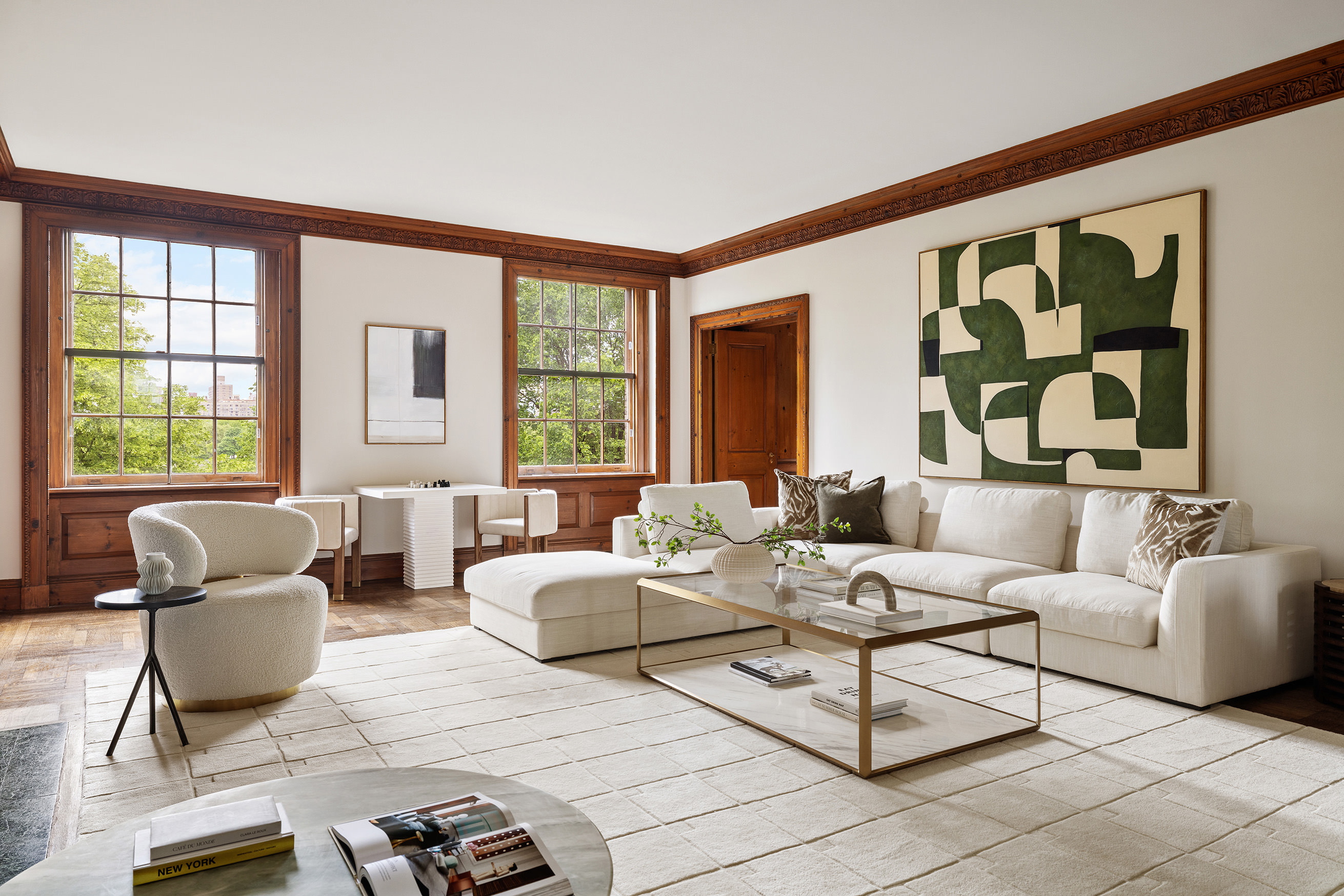 1120 5th Avenue, Unit 7B Manhattan, NY 10128 - Photo 2 of 17 a living room with furniture and large windows