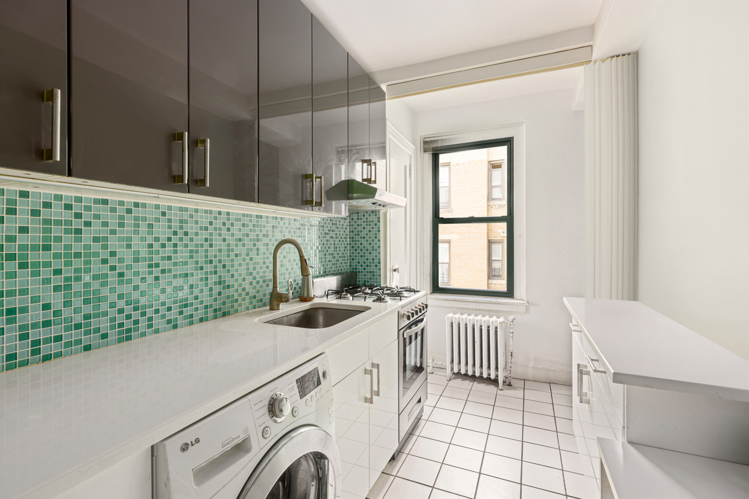 65 West 95th Street, Unit 8C Manhattan, NY 10025 - Photo 10 of 15 a view of a bathroom with washing machine and sink