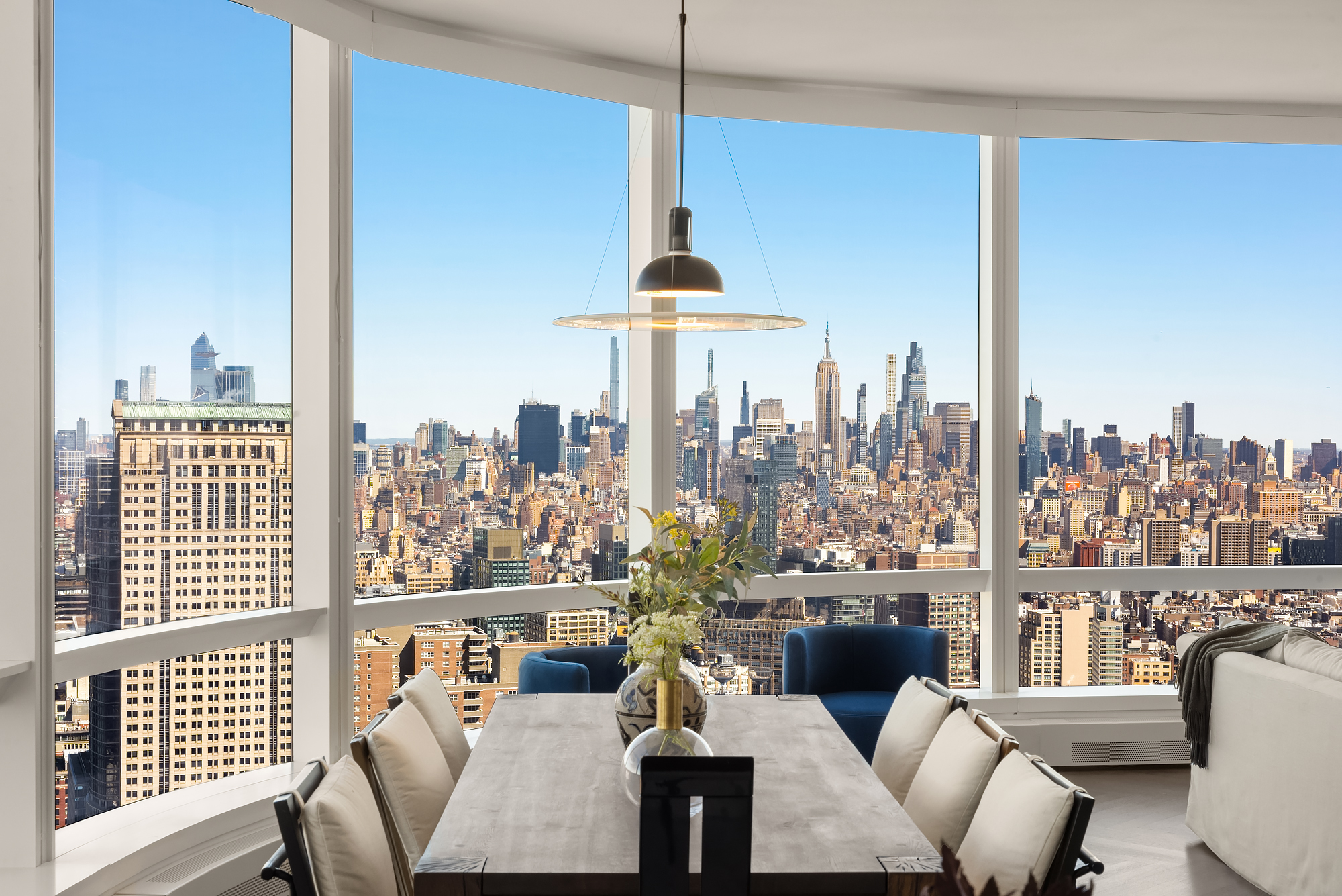 111 Murray Street, Unit 49W Manhattan, NY 10007 - Photo 13 of 36 a view of a dining room with furniture window and outside view