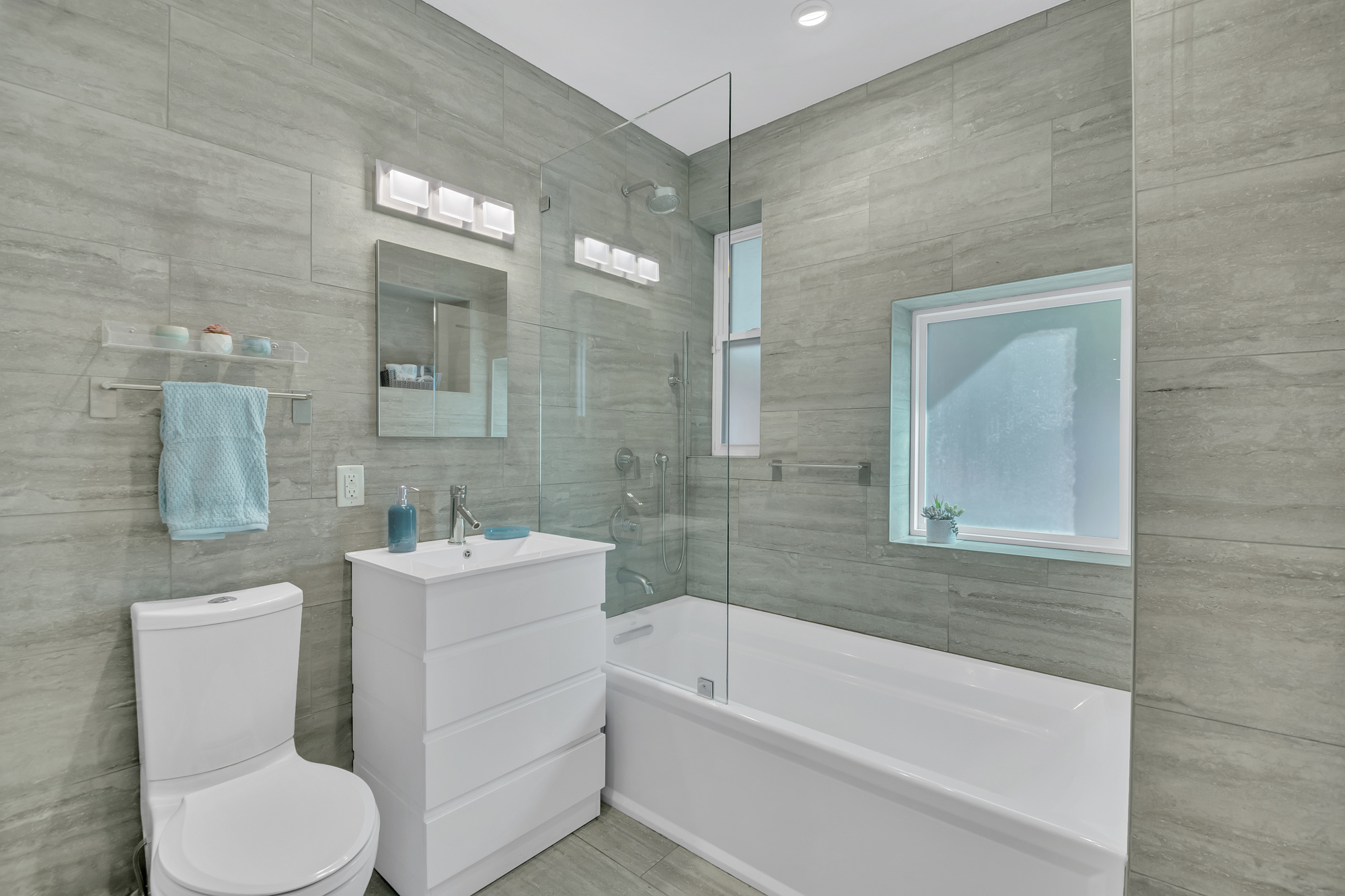 216 West 137th Street, Unit GARDEN Manhattan, NY 10030 - Photo 10 of 13 a bathroom with a toilet a sink and bathtub