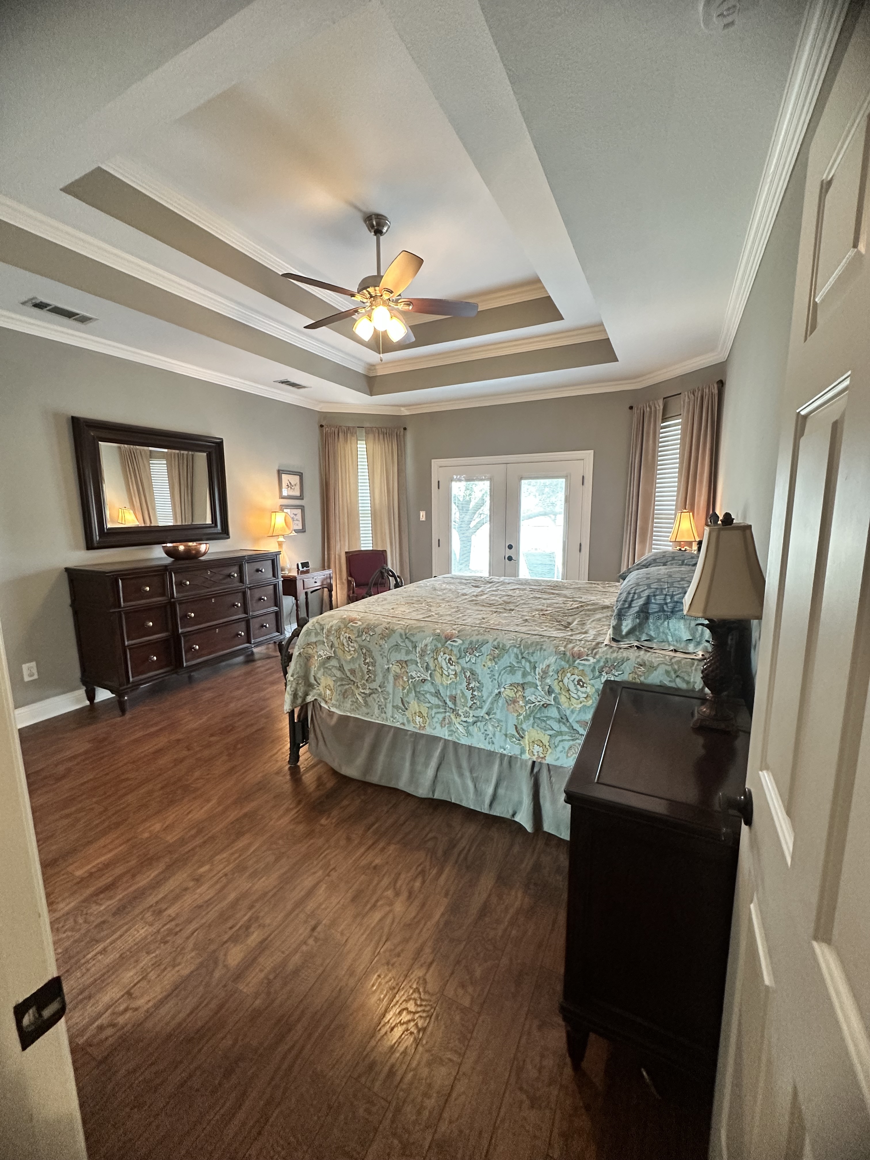 3588 Heritage Trail Celina, TX 75009 - Photo 10 of 19 a bedroom with a bed and wooden floor