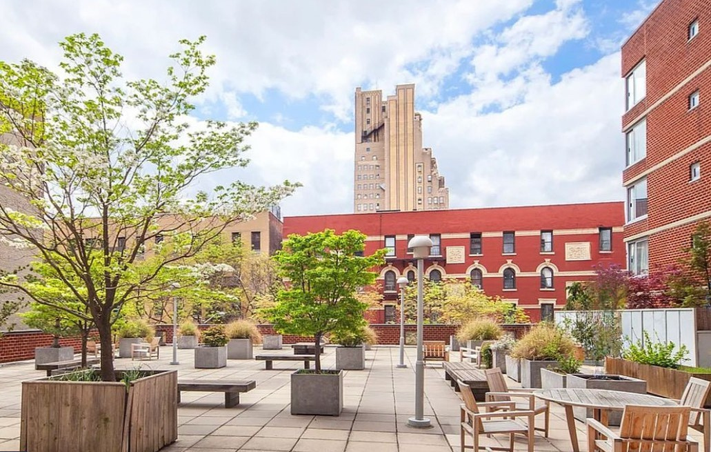 270 West 17th Street, Unit 4L Manhattan, NY 10011 - Photo 9 of 11 a view of a patio with couches table and chairs and potted plants