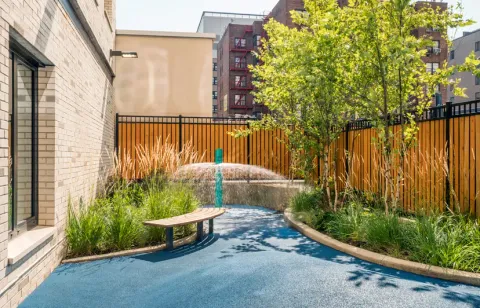 a view of a terrace with furniture and stove