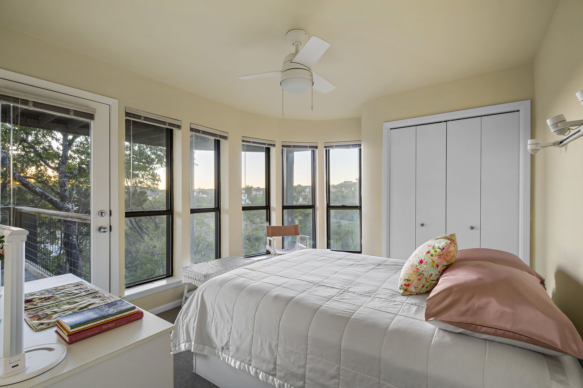 1605 The High Road Austin, TX 78746 - Photo 33 of 45 a bedroom with a bed and a window