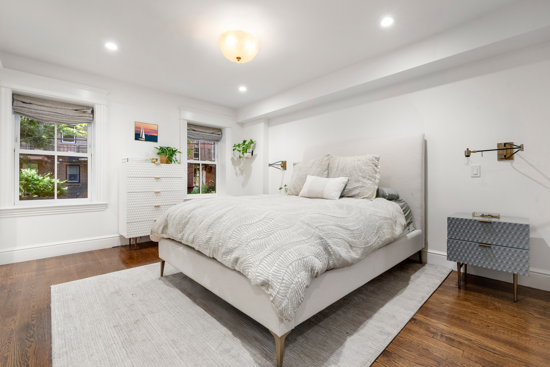 34 Dwight Street, Unit 1 Boston, MA 02118 - Photo 15 of 33 a bedroom with a large bed and a window