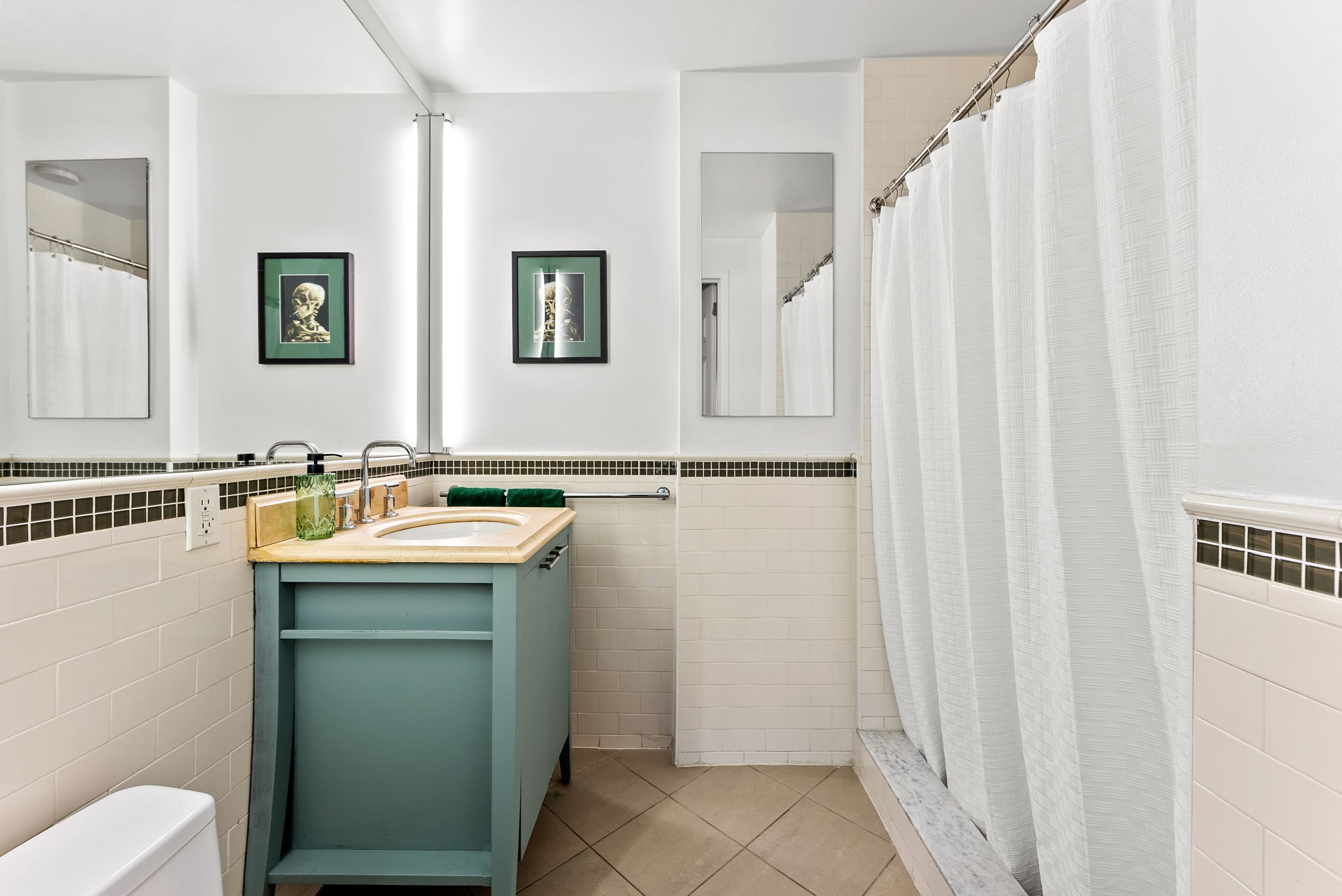 106 West 116th Street, Unit 2A Manhattan, NY 10026 - Photo 9 of 16 a bathroom with a sink and mirror