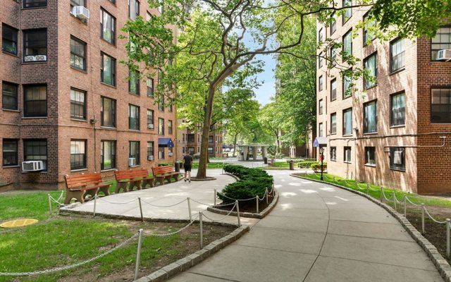 325 Clinton Avenue, Unit 7A Brooklyn, NY 11205 - Photo 11 of 13 a view of a building with garden