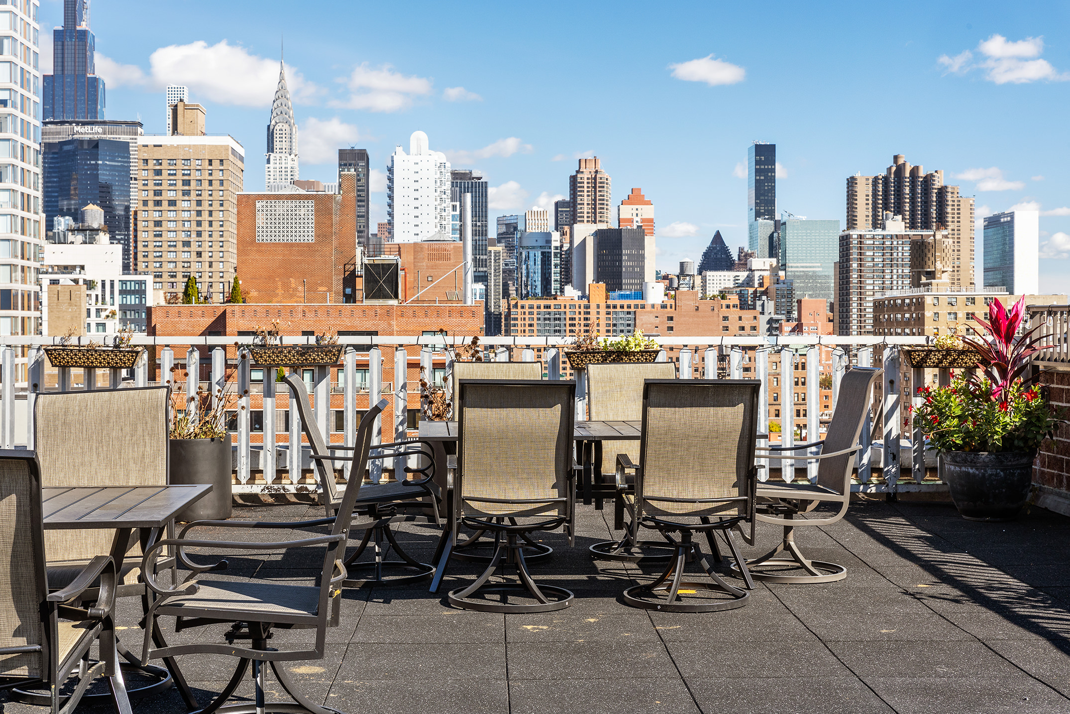 200 East 24th Street, Unit 201 Manhattan, NY 10010 - Photo 6 of 7 a view of a terrace with chairs
