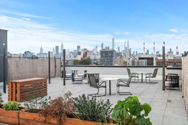 a view of a terrace with sitting area