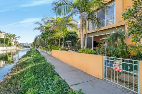 a view of a street with brick building