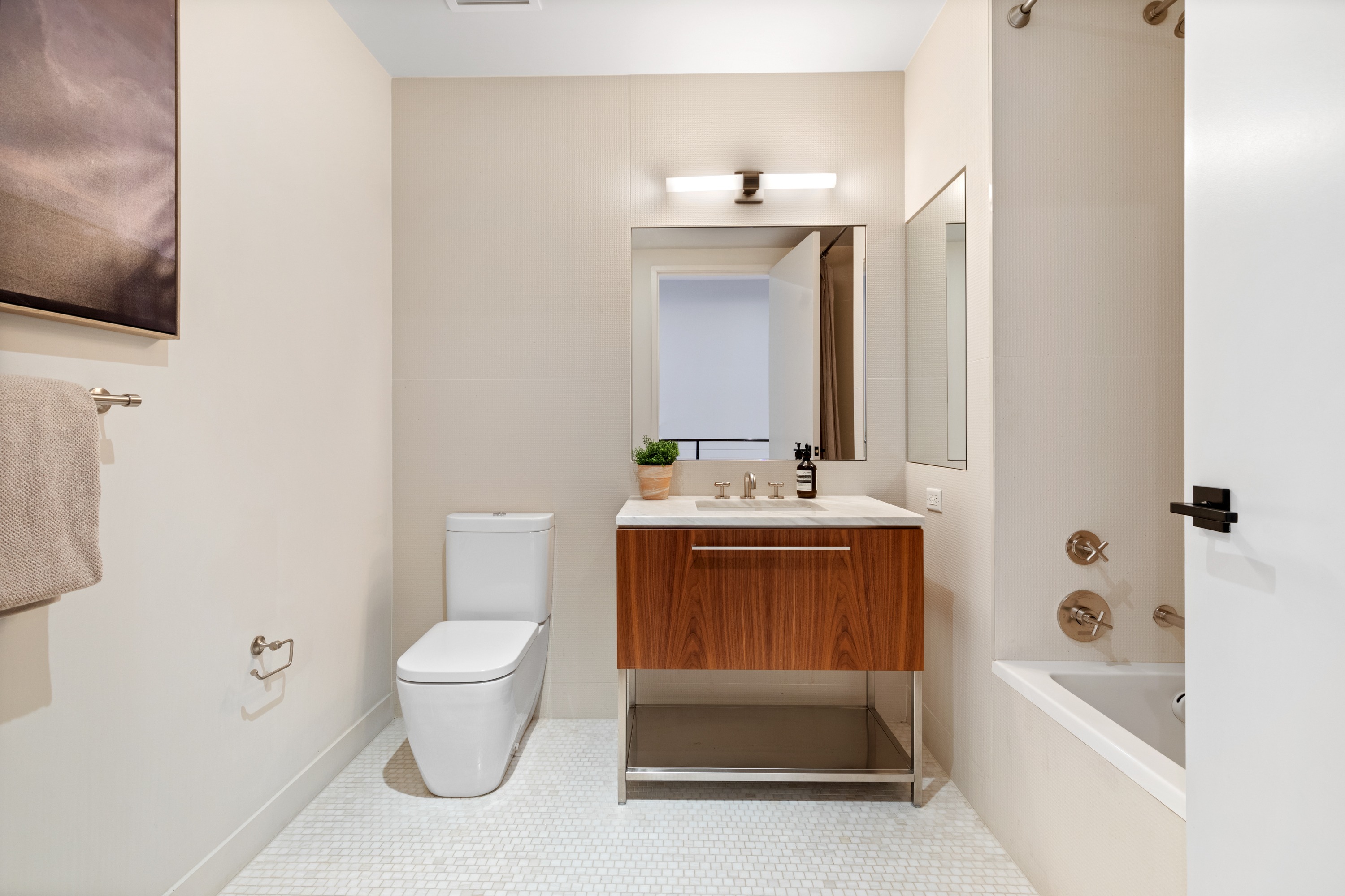 90 Furman Street, Unit N107 Brooklyn, NY 11201 - Photo 16 of 30 a bathroom with a sink toilet and shower