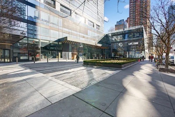 a view of a building with a yard