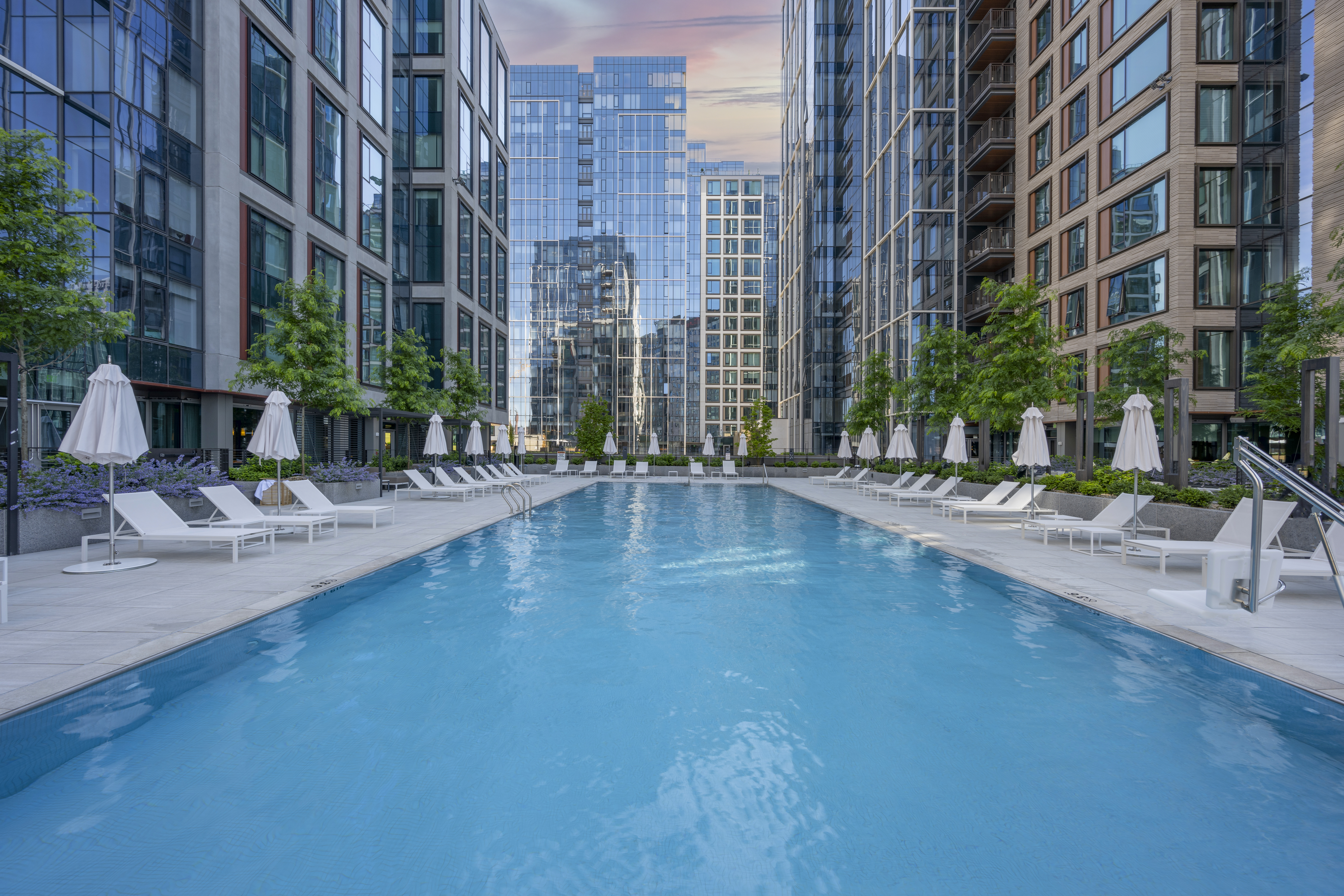 131 Seaport Boulevard Boston, MA 02210 - Photo 10 of 11 a swimming pool with outdoor seating and yard