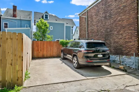 a car parked in front of a house
