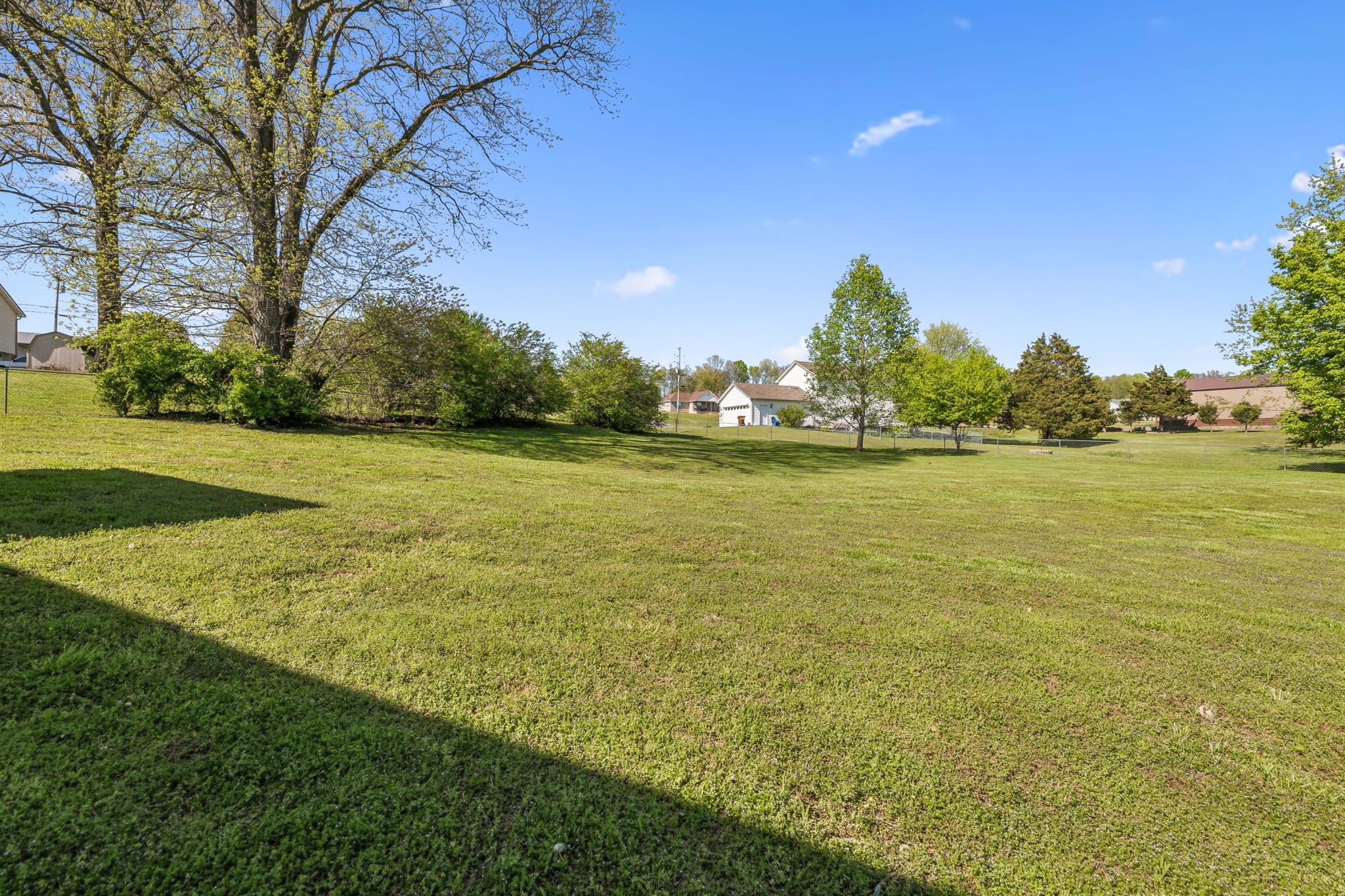 405 Billy Lane Spring Hill, TN 37174 - Photo 32 of 39 a view of a large body of water with a building in the background