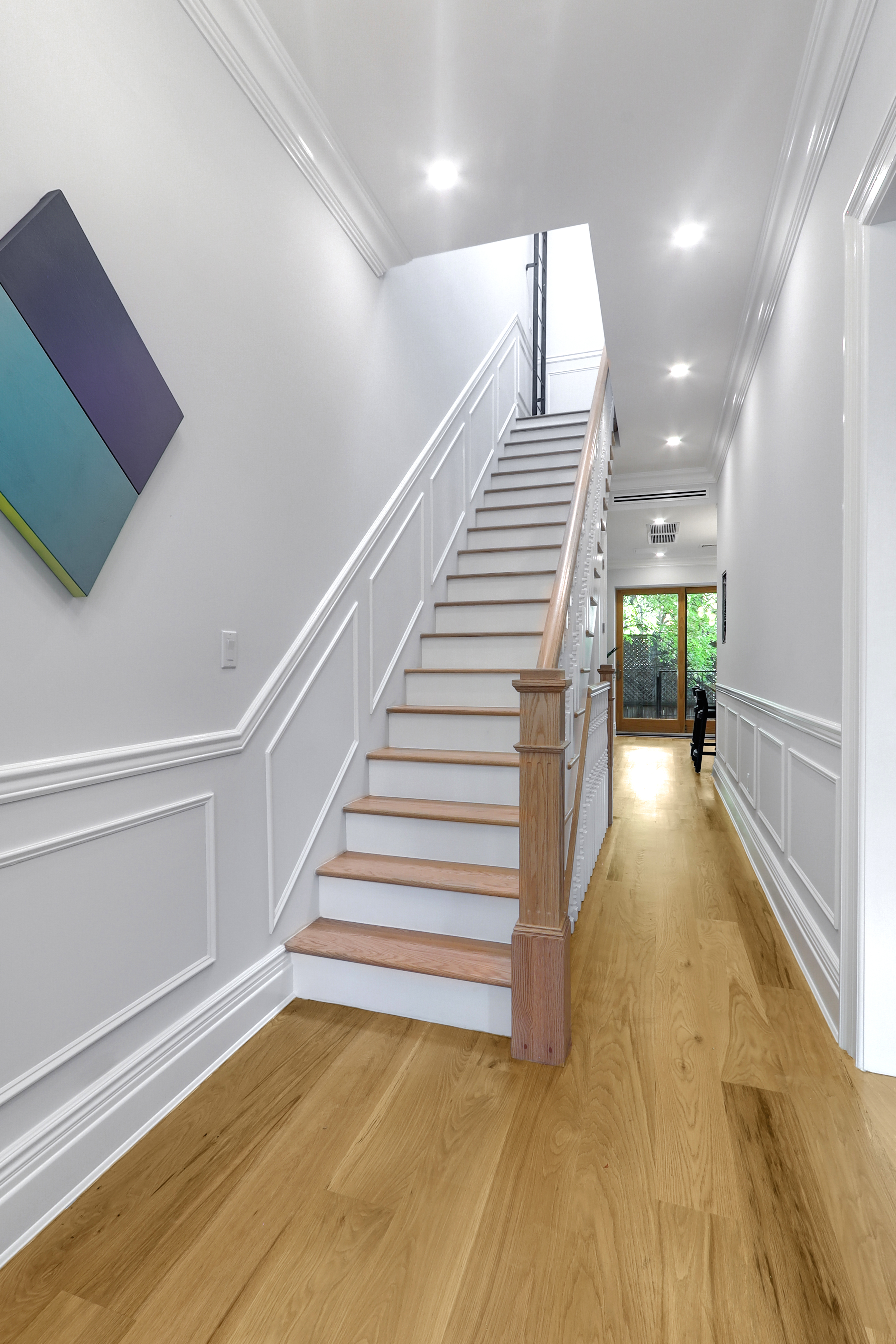 220 Lewis Avenue Brooklyn, NY 11221 - Photo 5 of 22 a view of entryway and hall with wooden floor