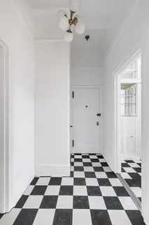 a room with a black and white checkered floor