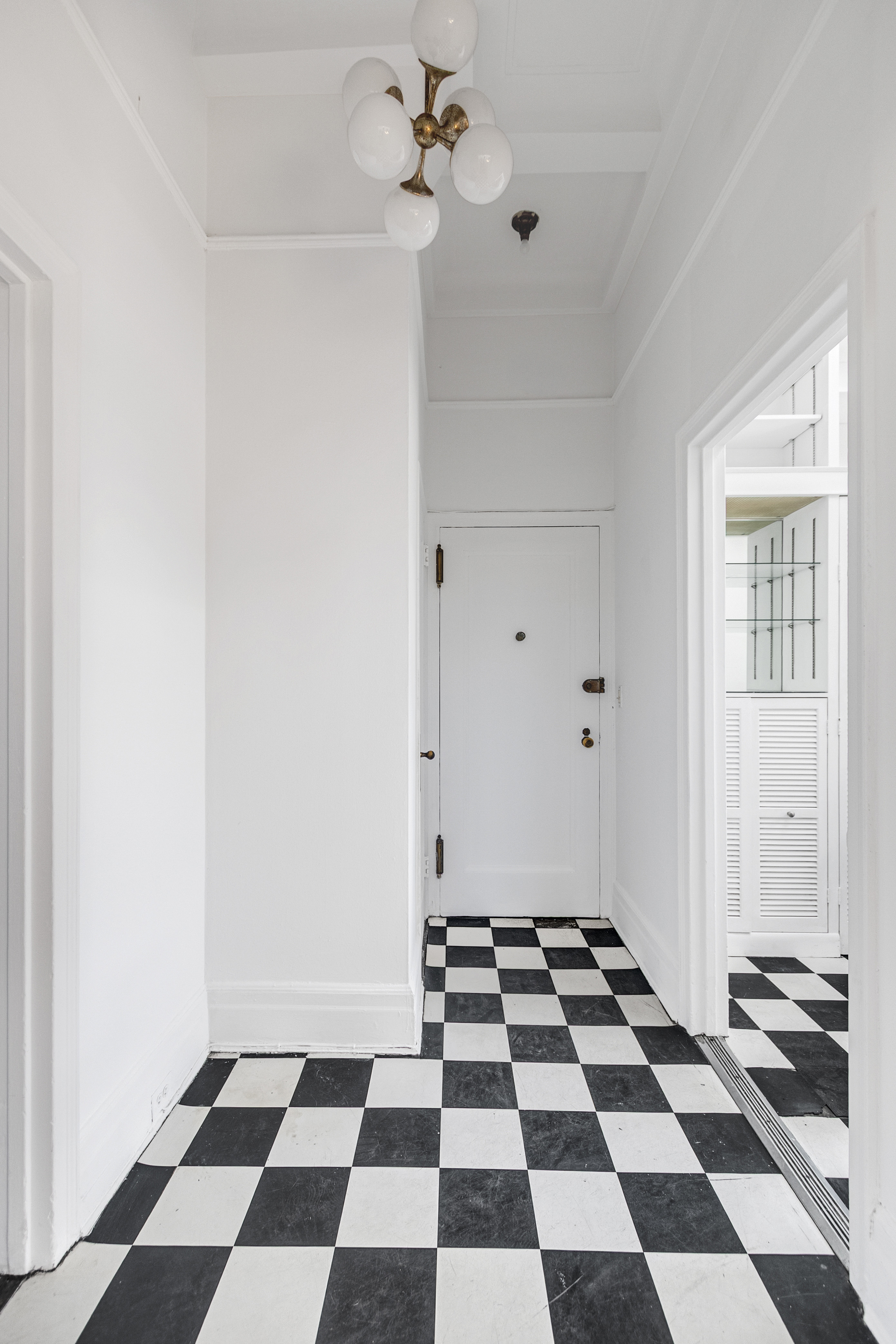 470 West End Avenue, Unit PH-G New York, NY 10024 - Photo 13 of 22 a room with a black and white checkered floor
