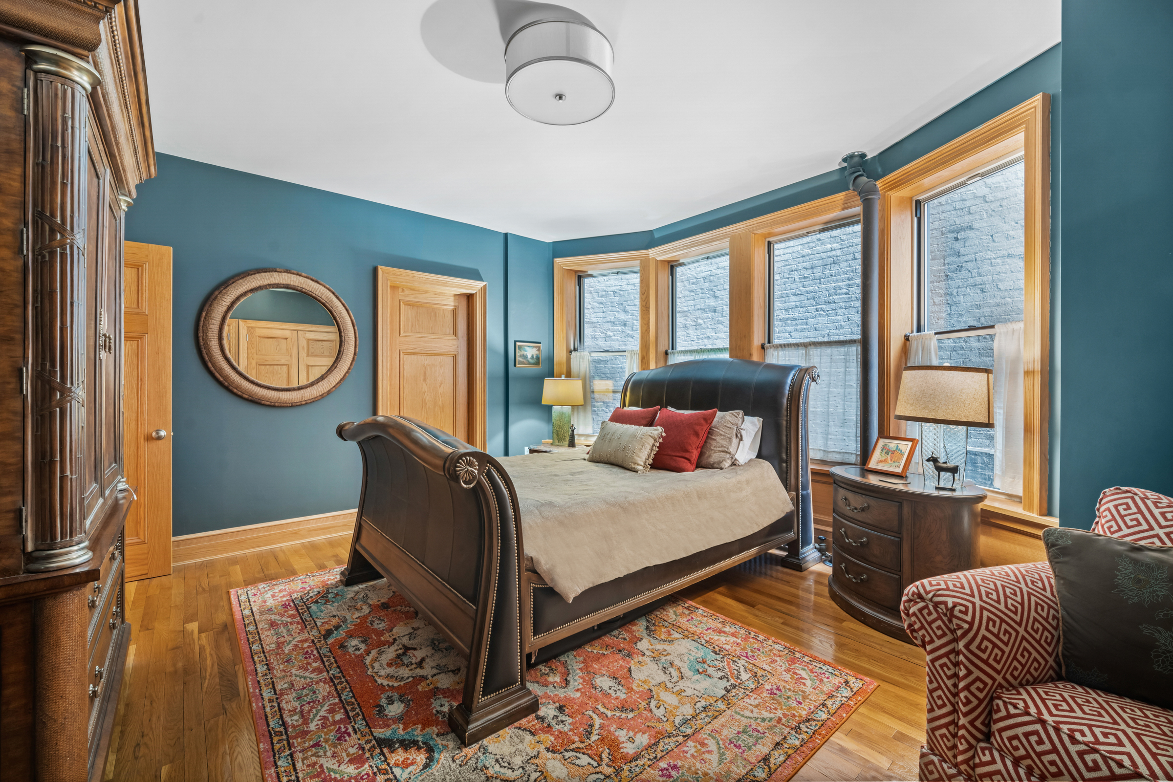 300 West 109th Street, Unit 2JK Manhattan, NY 10025 - Photo 11 of 18 a bed sitting in a bedroom next to a window