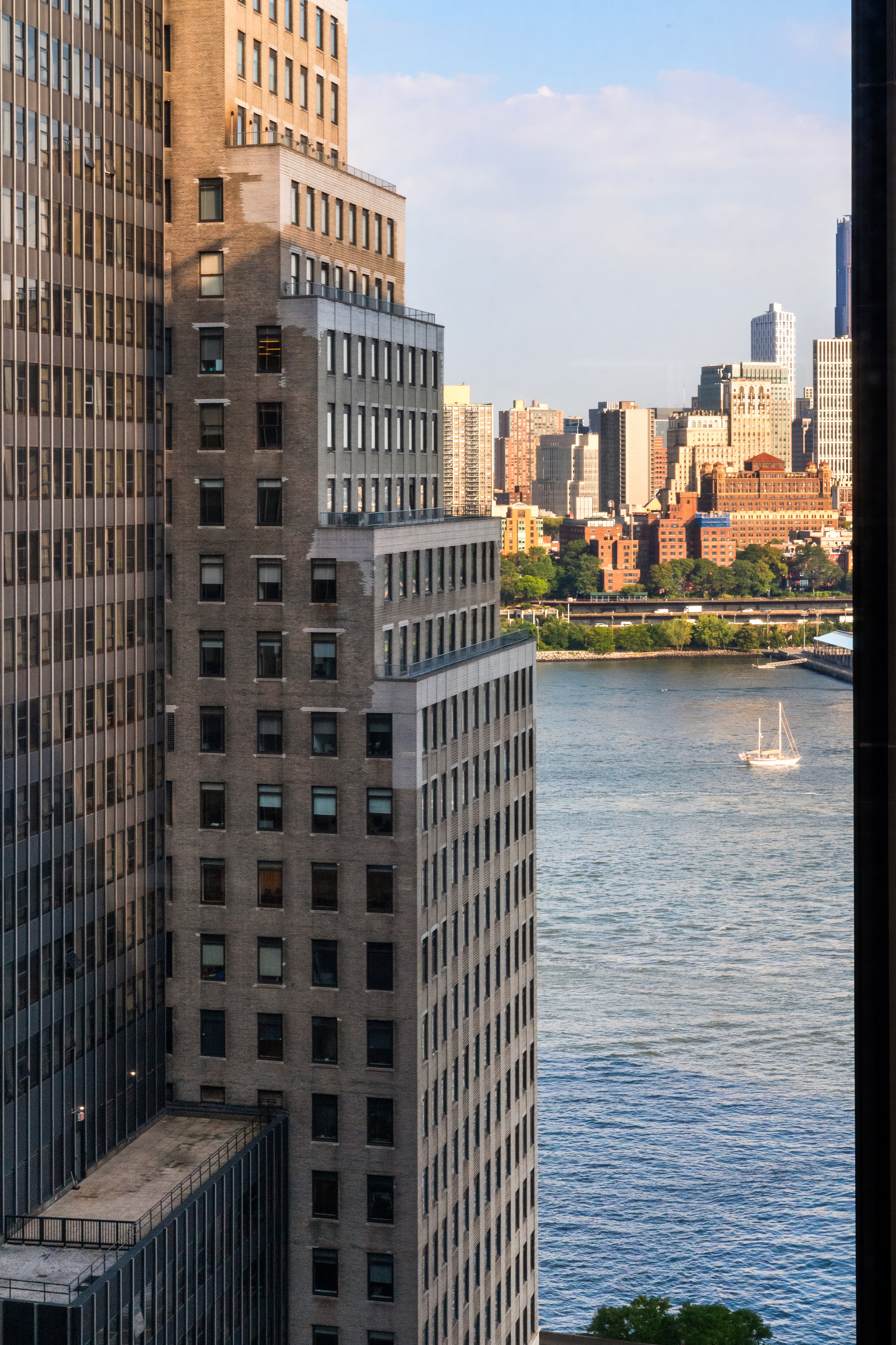75 Wall Street, Unit 22O Manhattan, NY 10005 - Photo 6 of 11 a view of a city with tall buildings