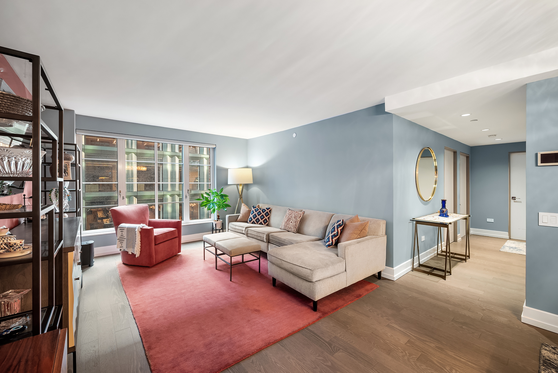 70 Charlton Street, Unit 11A Manhattan, NY 10014 - Photo 3 of 22 a living room with furniture and a window