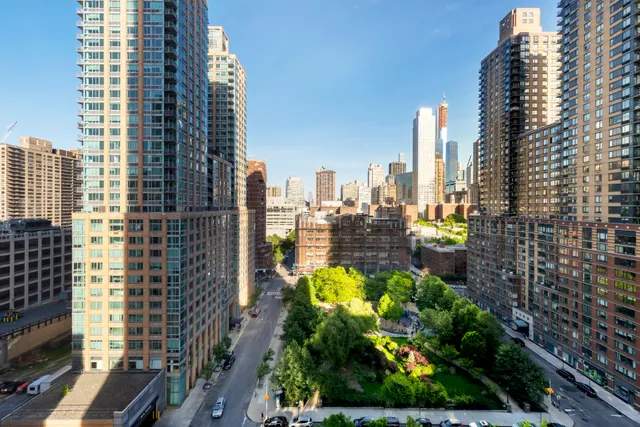 80 Riverside Boulevard, Unit 12D Manhattan, NY 10069 - Photo 14 of 16 a city view with tall buildings