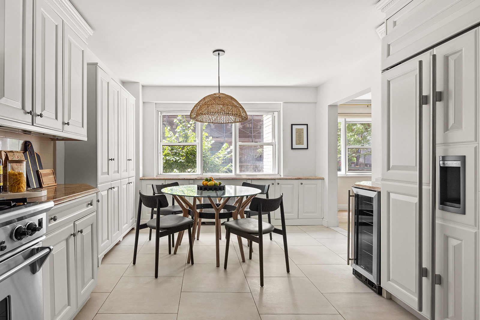 69 West 9th Street, Unit 2B Manhattan, NY 10011 - Photo 5 of 18 a view of a dining room with furniture window and outside view