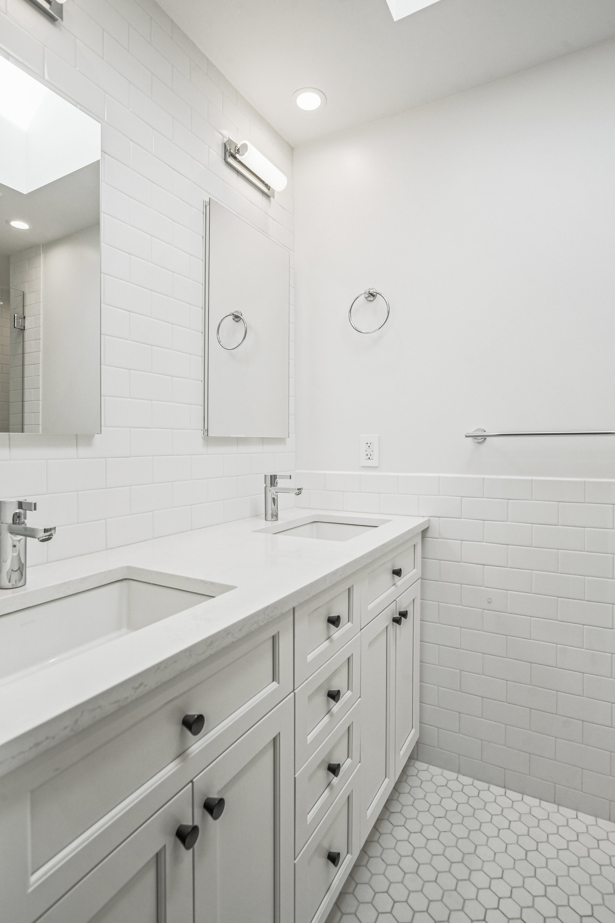 1920 35th Street Northwest Washington, DC 20007 - Photo 20 of 54 a bathroom with a sink double vanity and a shower