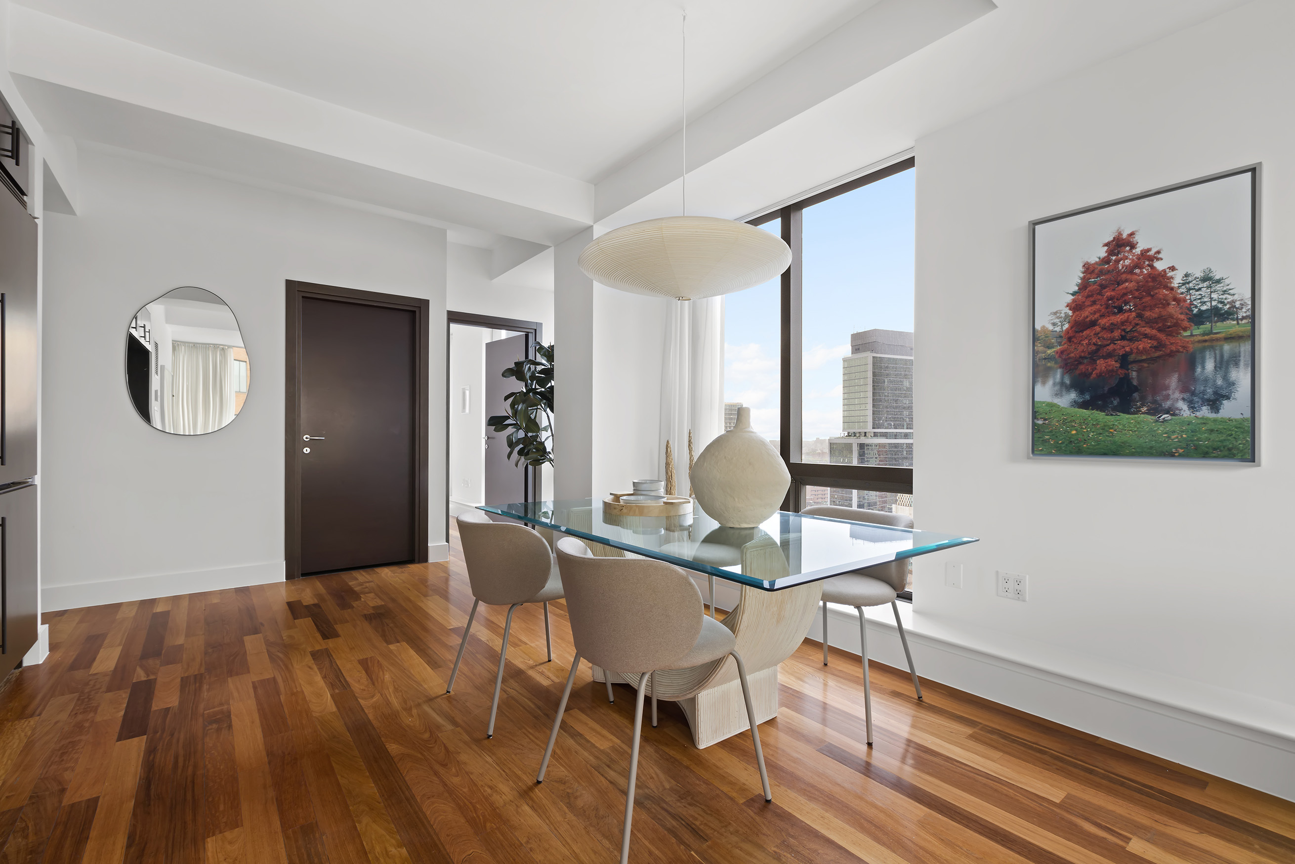 150 Myrtle Avenue, Unit 2506 Brooklyn, NY 11201 - Photo 10 of 16 a workspace with wooden floor and a mirror