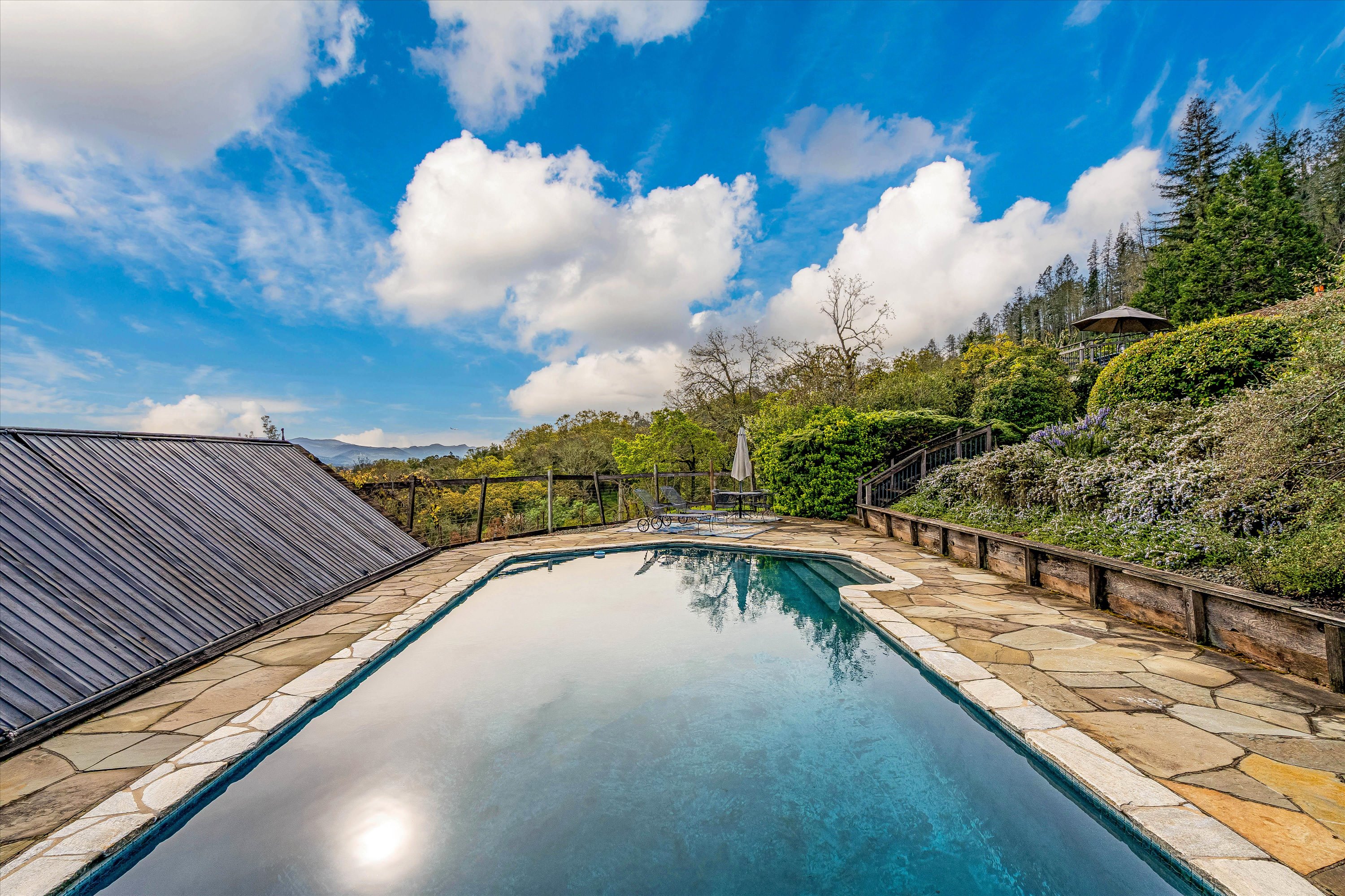 1291 Rockland Drive St. Helena, CA 94574 - Photo 23 of 26 a view of a swimming pool with a balcony