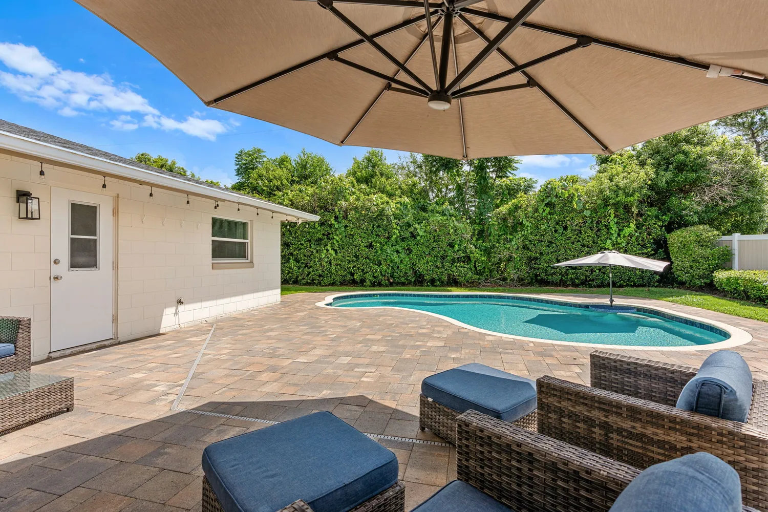 swimming pool view with patio