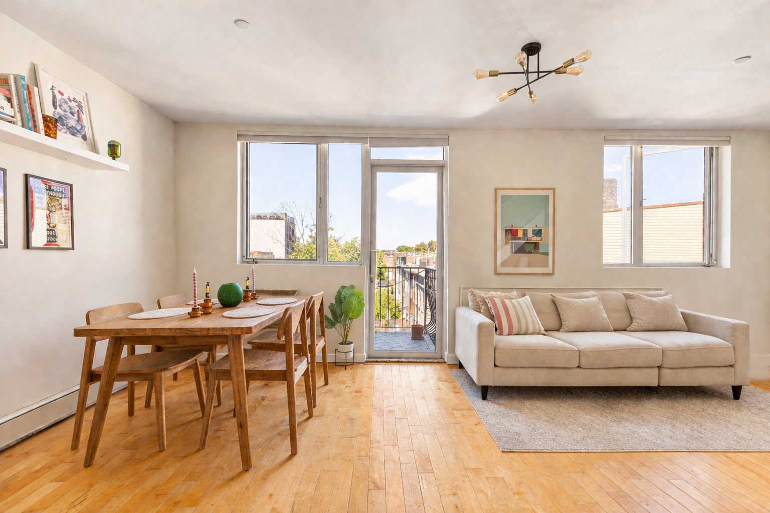 93-95 Wyckoff Avenue, Unit 4B Brooklyn, NY 11237 - Photo 1 of 10 a living room with furniture and a large window