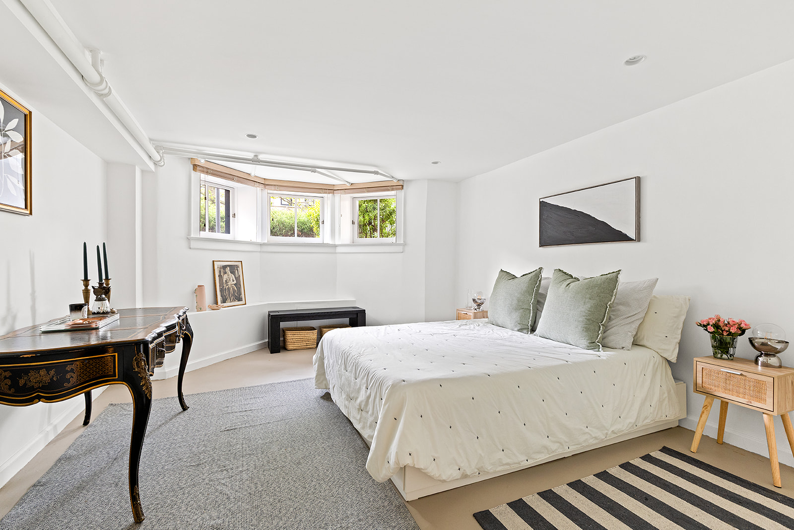 125 Rutland Road Brooklyn, NY 11225 - Photo 15 of 22 a bedroom with a bed and a table