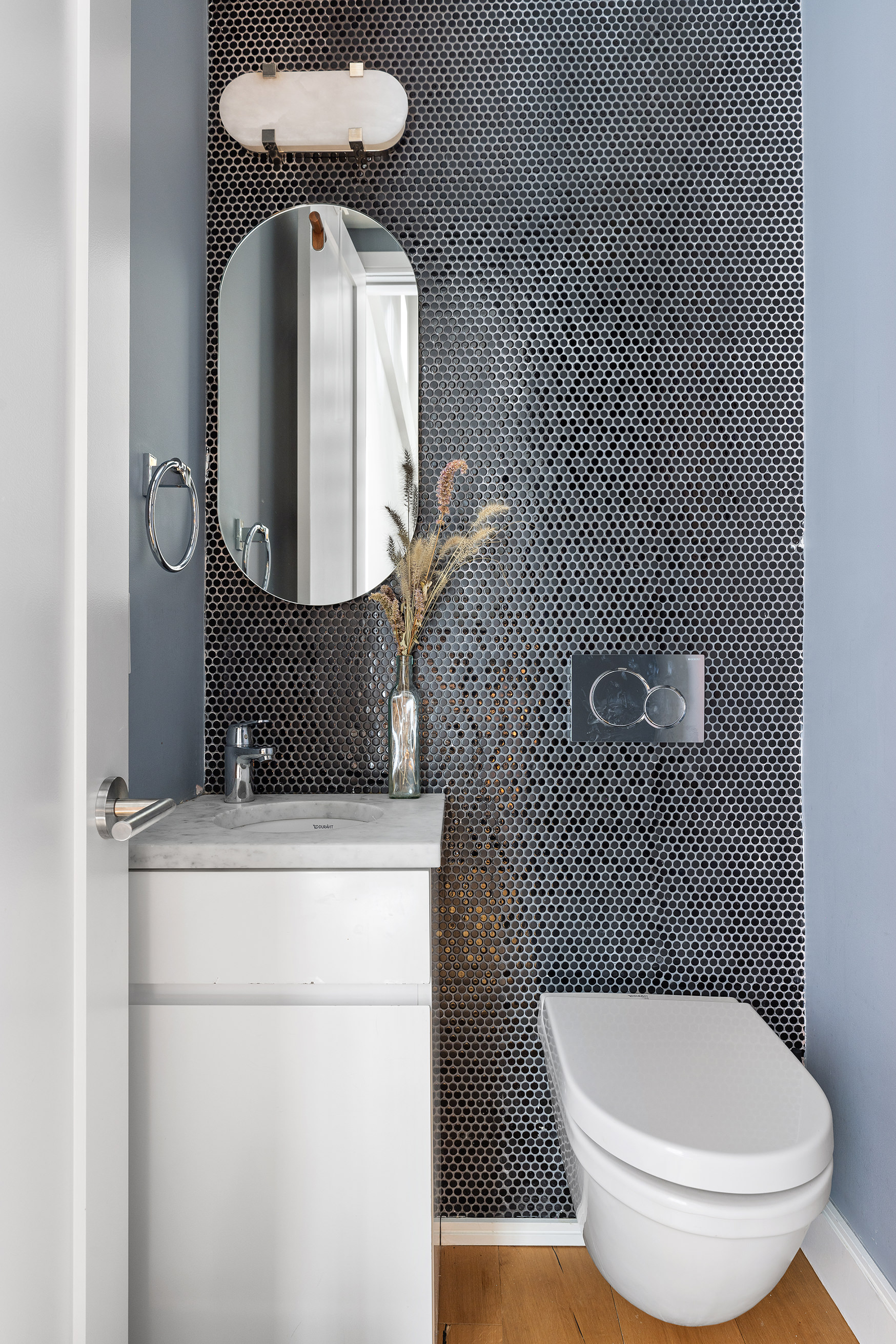 43 Dean Street Brooklyn, NY 11201 - Photo 5 of 17 a bathroom with a toilet and a mirror