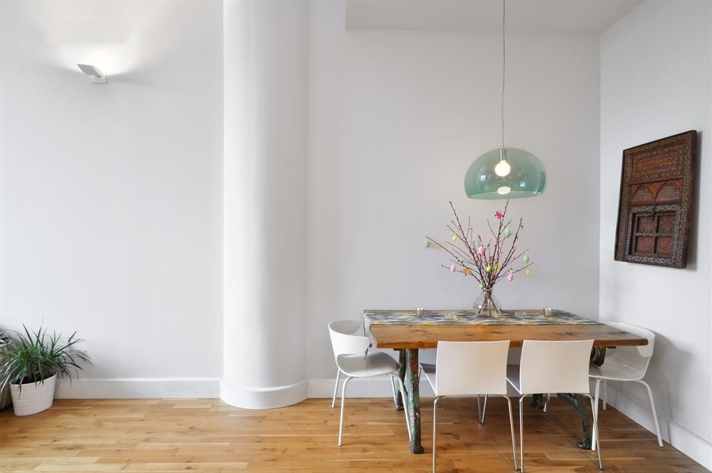360 Furman Street, Unit 511 Brooklyn, NY 11201 - Photo 5 of 37 a view of a dining room with furniture and wooden floor
