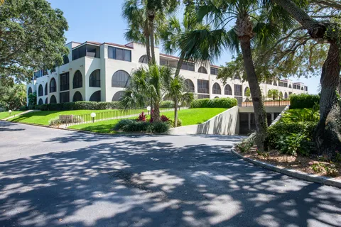 a view of a swimming pool with an outdoor space and seating area