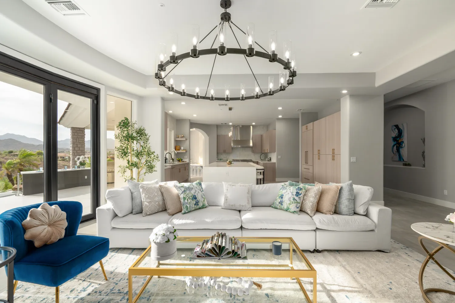 a bedroom with furniture and a floor to ceiling window