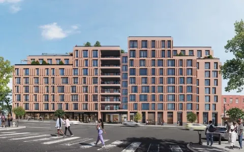 a front view of a building with a street