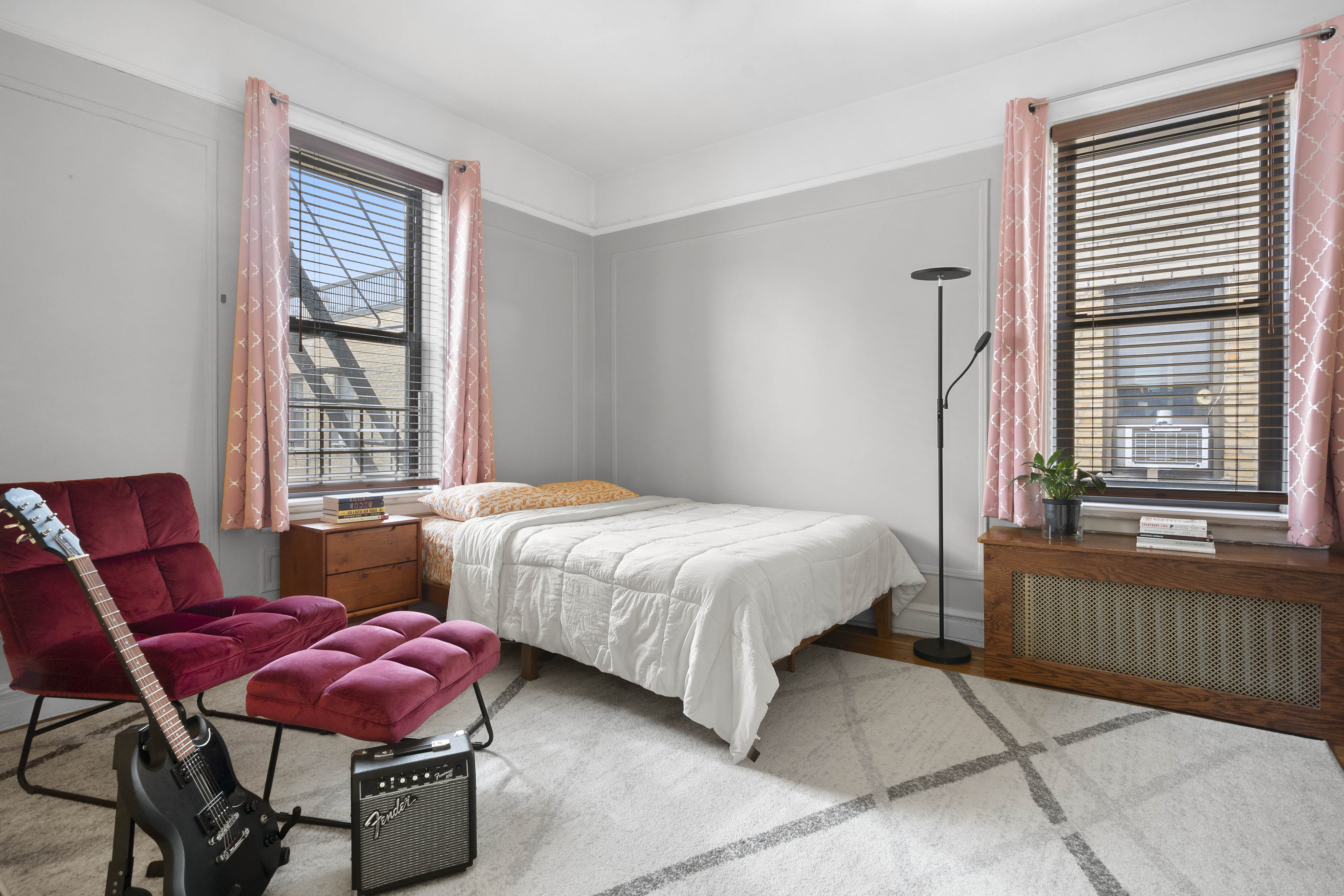 371 Fort Washington Avenue, Unit 6C Manhattan, NY 10033 - Photo 4 of 11 a bedroom with a bed and windows