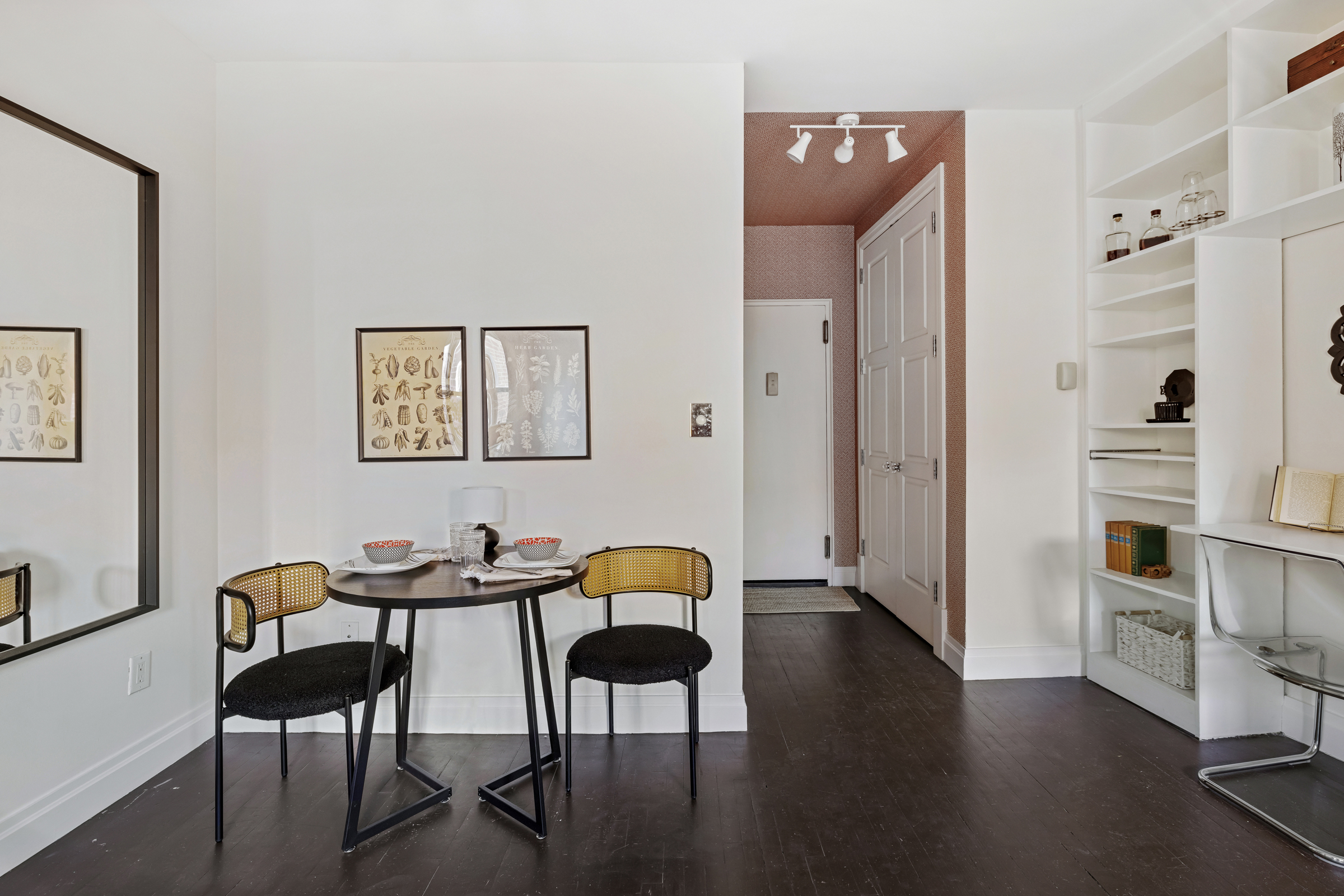 99 Bank Street, Unit 7E Manhattan, NY 10014 - Photo 4 of 8 a view of a workspace with furniture and wooden floor