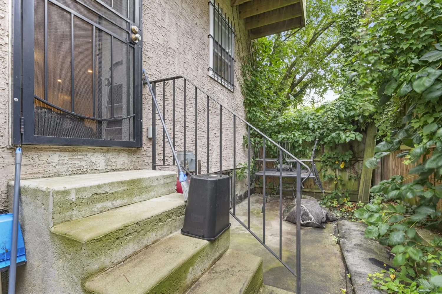 a kitchen with a sink a stove and cabinets