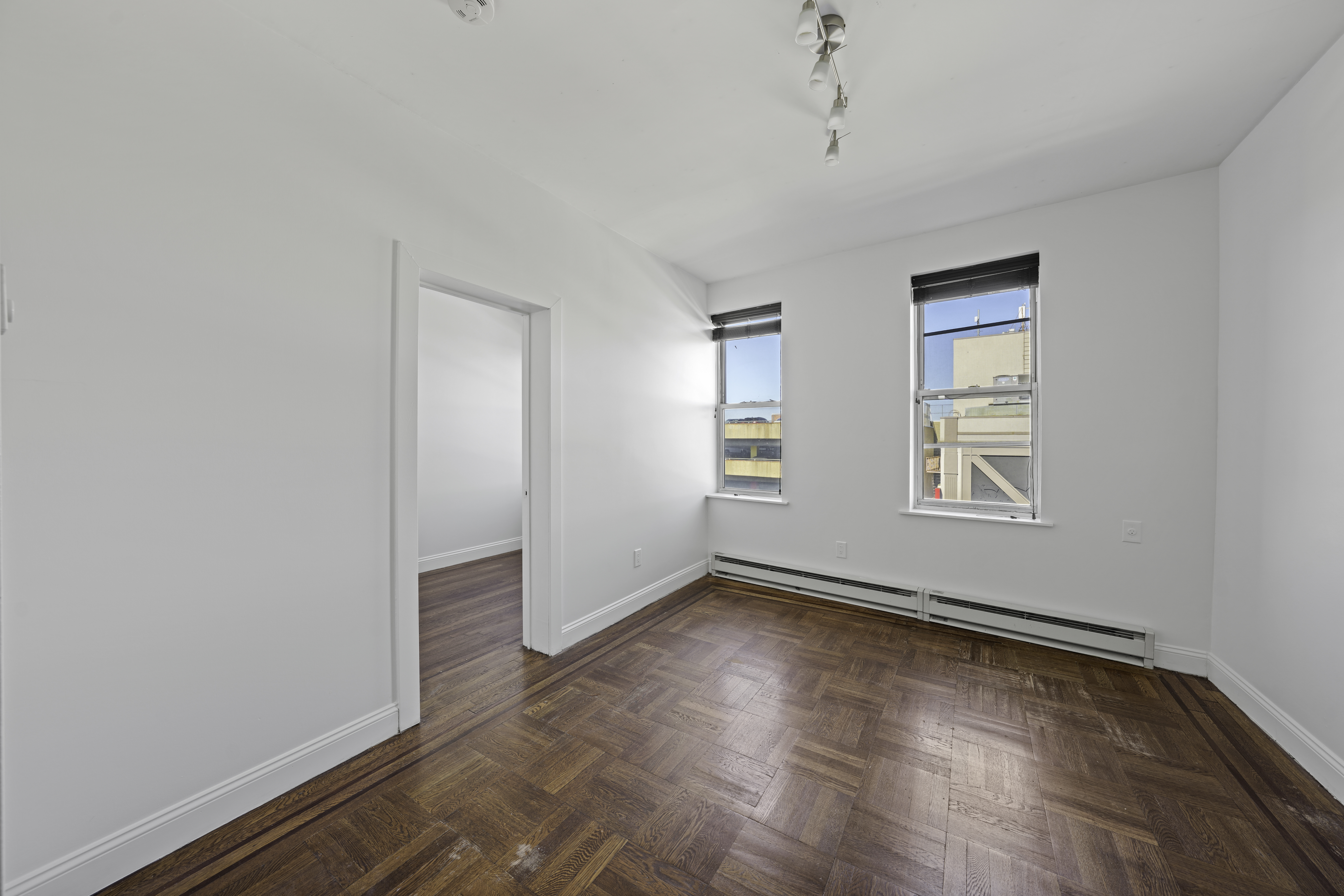 514 86th Street, Unit 4 Brooklyn, NY 11209 - Photo 11 of 19 an empty room with window