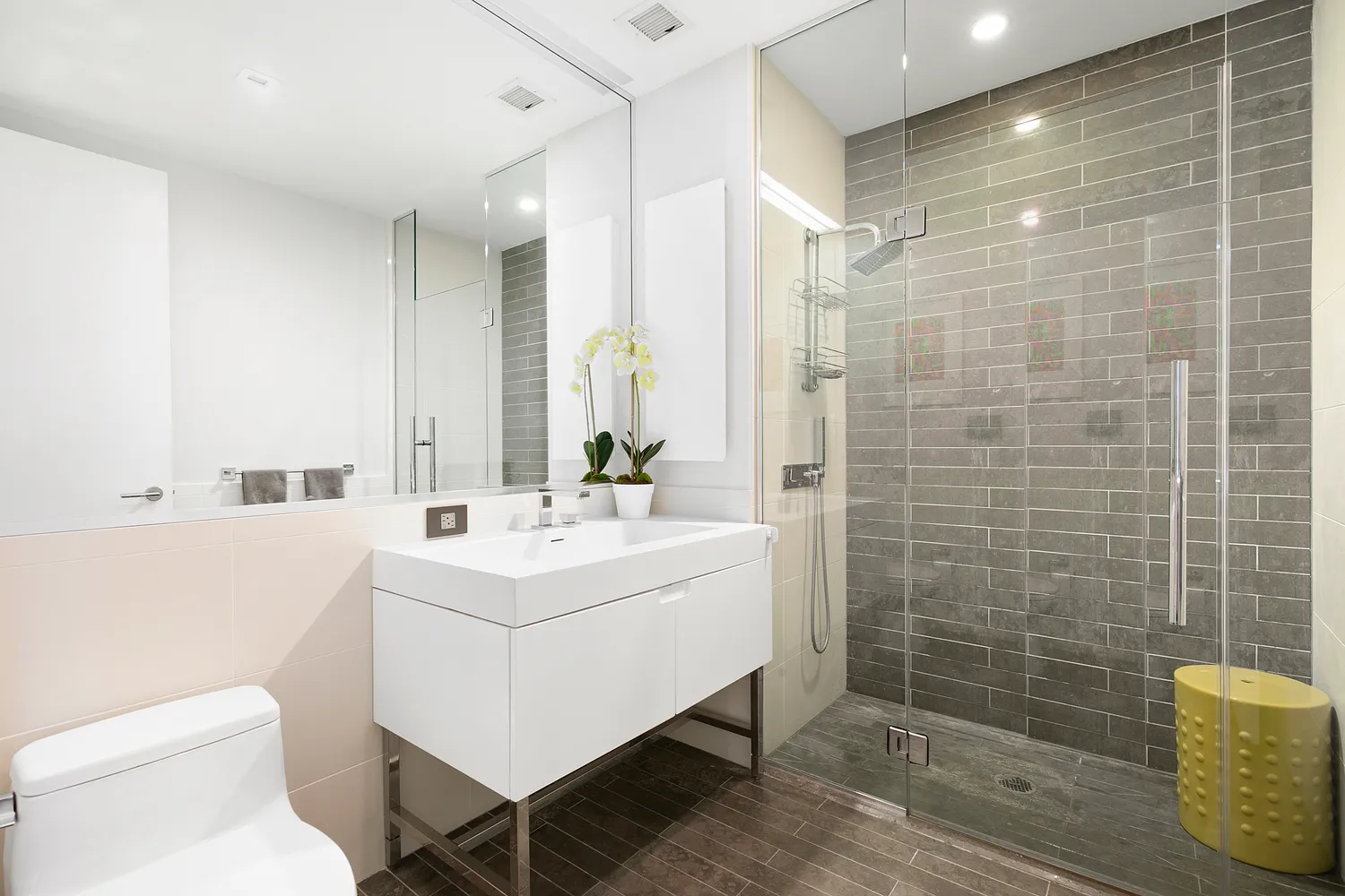 a bathroom with a sink toilet and shower