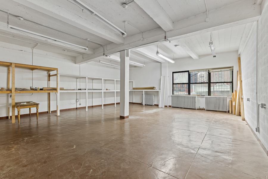 315 East 91st Street, Unit 6C Manhattan, NY 10128 - Photo 6 of 8 a view of a livingroom with furniture and a window